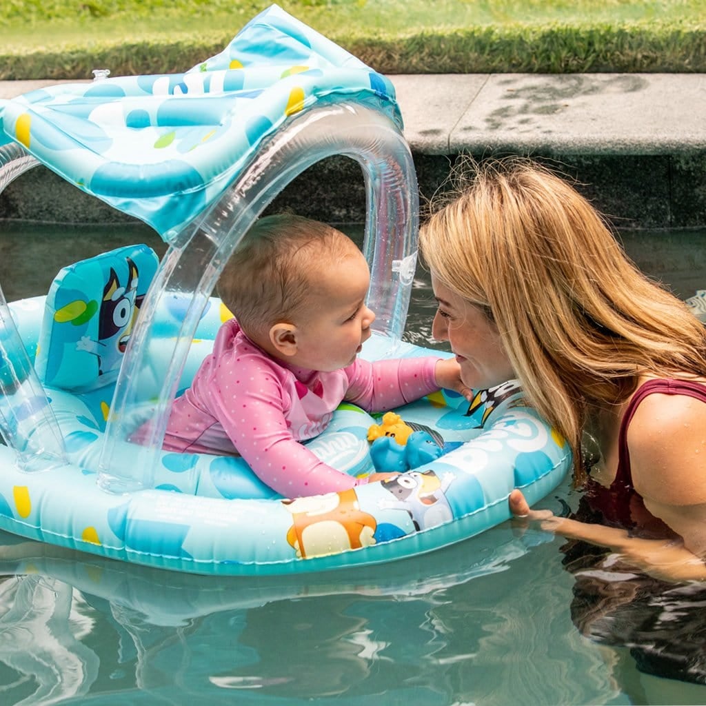 Mother and Daughter in pool with child in Wahu x Bluey Ring w/Seat &amp; Canopy 6-24 months-15kg
